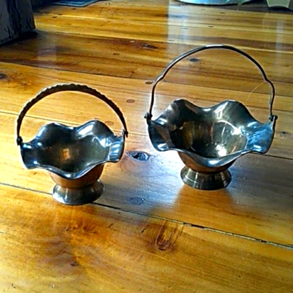 Set of brass baskets.